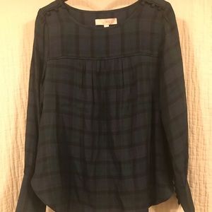 Plaid blouse with sleeve and shoulder buttons